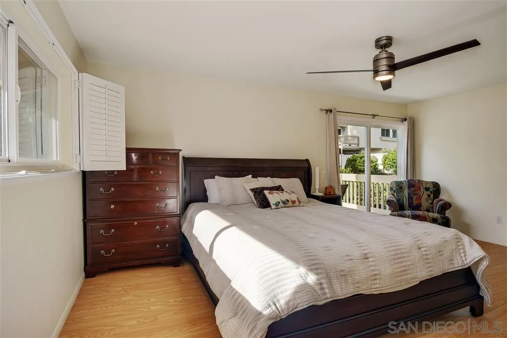 210 Countryhaven Road Encinitas, CA 92024 - Photo 13 of 25 a bedroom with a bed and a window