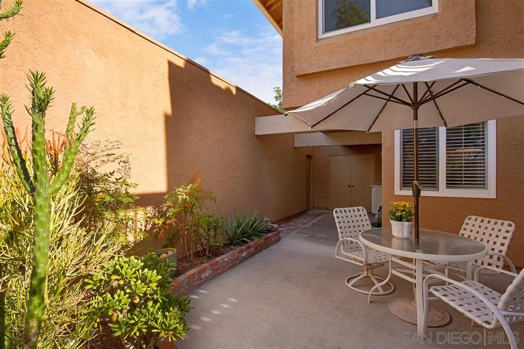 210 Countryhaven Road Encinitas, CA 92024 - Photo 23 of 25 a table and chairs in patio