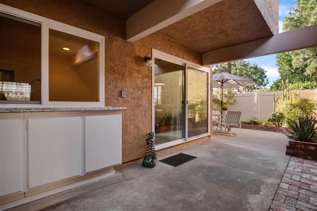 210 Countryhaven Road Encinitas, CA 92024 - Photo 24 of 25 a view of a room with gym equipment and floor to ceiling window