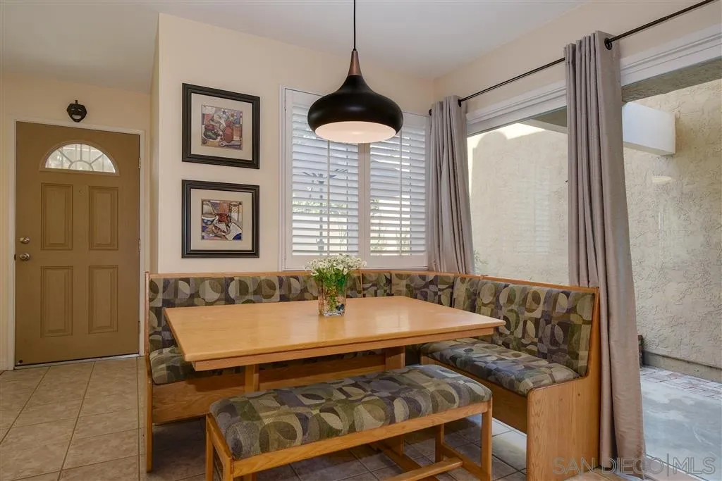 210 Countryhaven Road Encinitas, CA 92024 - Photo 8 of 25 a bath room with a table and a chandelier