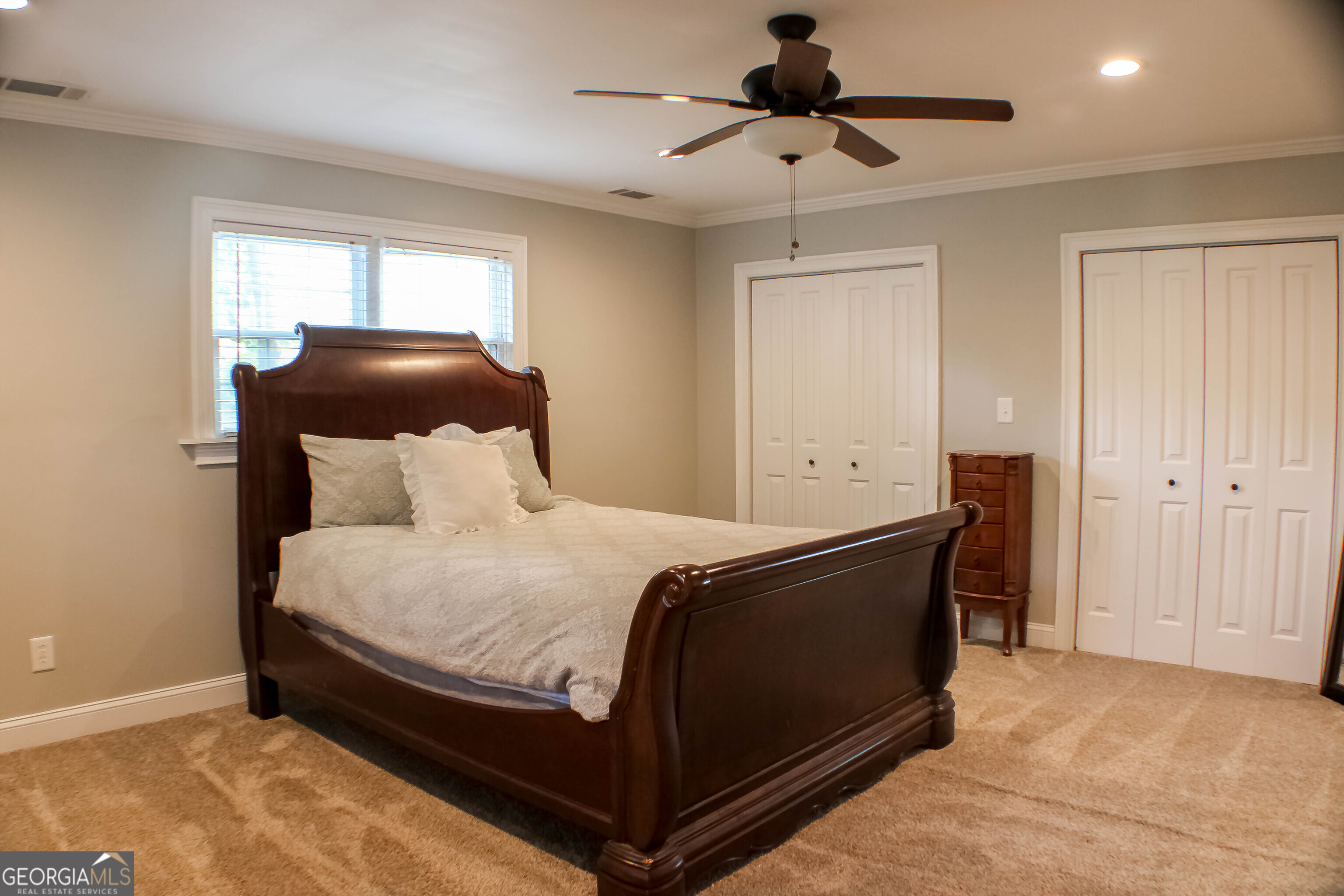 311 Roswell Avenue Southeast Rome, GA 30161 - Photo 14 of 21 a bed room with a bed and a ceiling fan