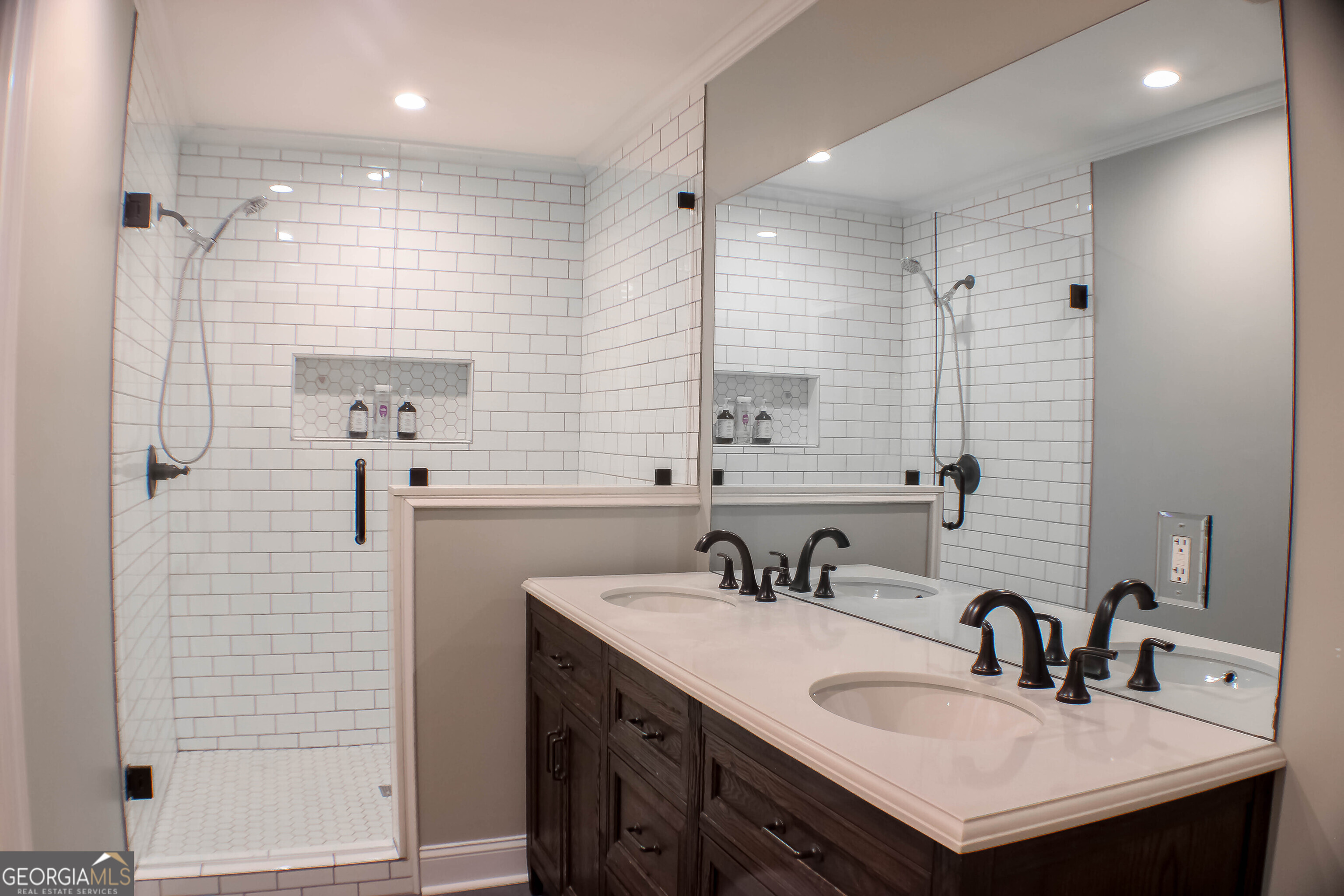 311 Roswell Avenue Southeast Rome, GA 30161 - Photo 18 of 21 a bathroom with a sink shower and a mirror