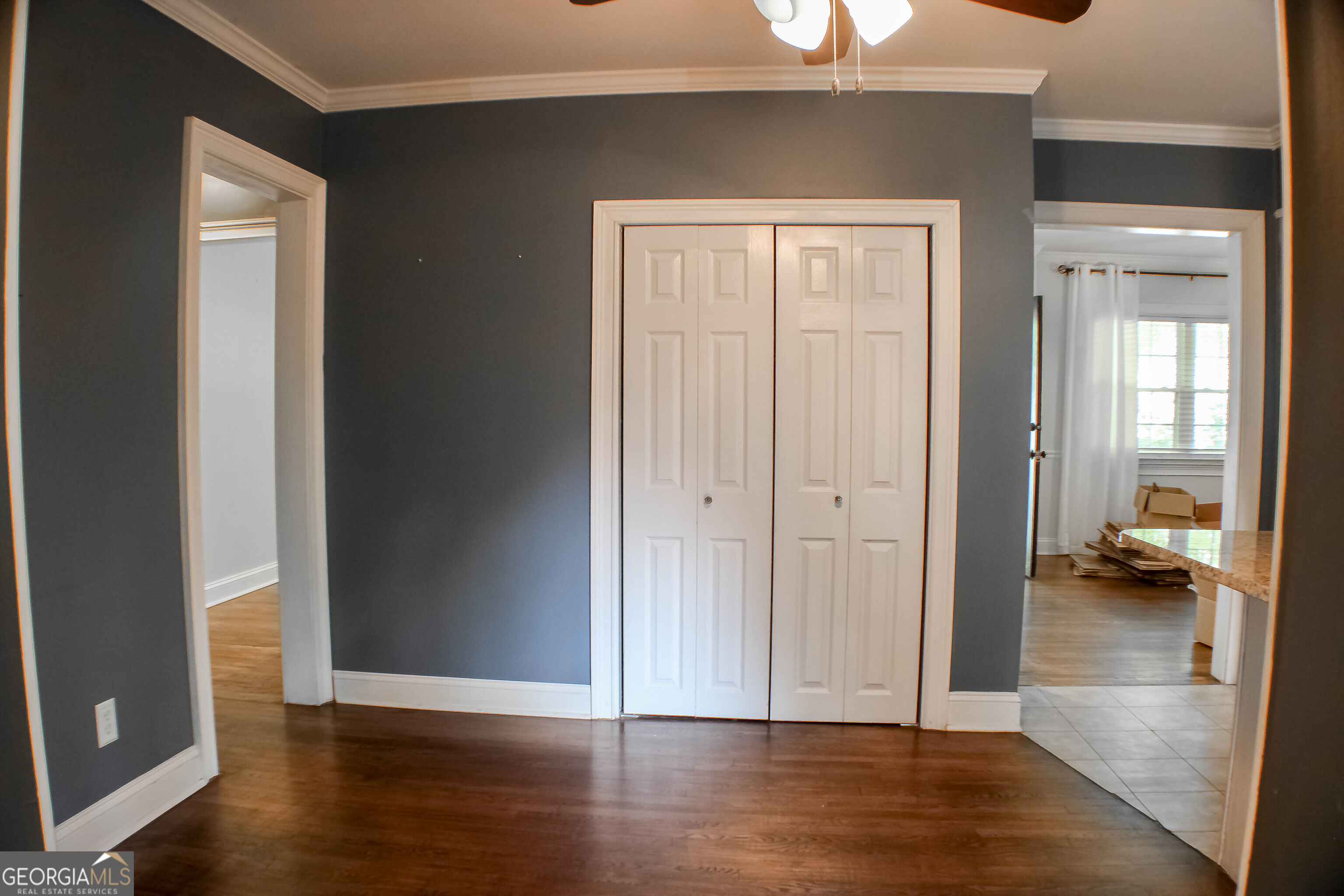 311 Roswell Avenue Southeast Rome, GA 30161 - Photo 9 of 21 a view of livingroom with hardwood floor and a ceiling fan