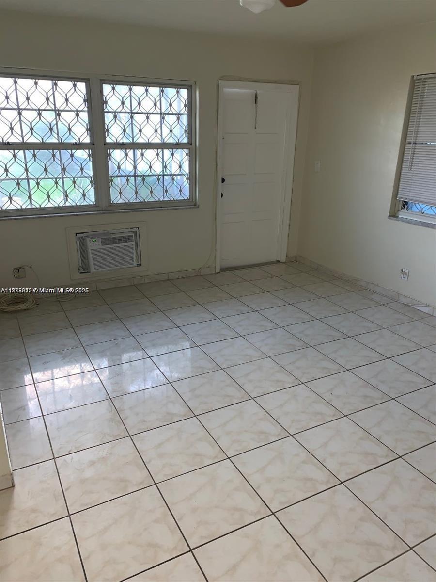 1850 Arthur Street, Unit 2 Hollywood, FL 33020 - Photo 12 of 20 a view of an empty room and a window