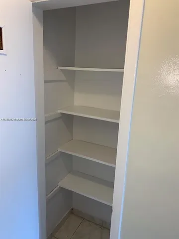 an empty room with closet