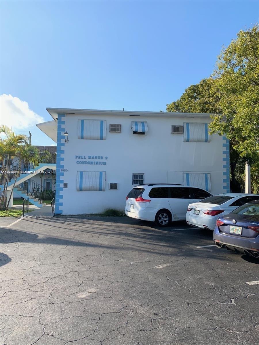 1850 Arthur Street, Unit 2 Hollywood, FL 33020 - Photo 9 of 20 a car parked in front of a house