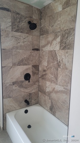 2 Center Street, Unit A Andover, CT 06232 - Photo 6 of 8 a bathroom with a bathtub