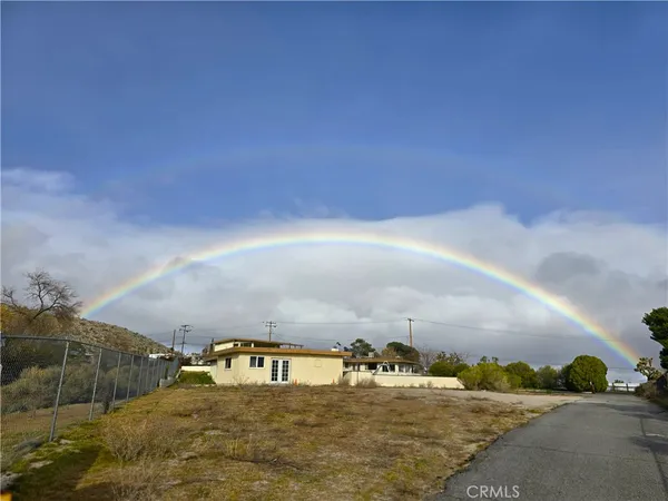 a view of a swimming pool with a lounge chairs
