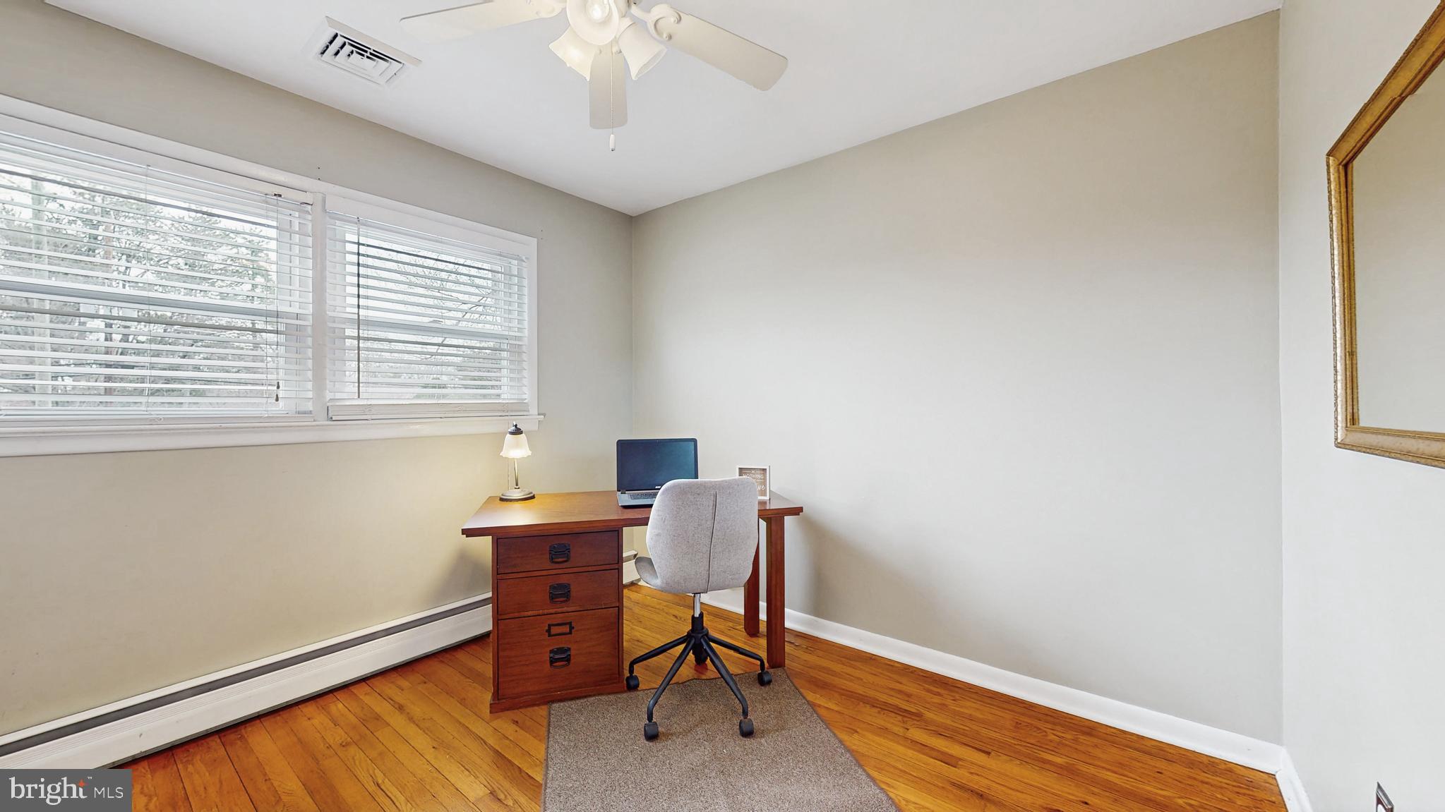 935 Bear Tavern Road Ewing, NJ 08628 - Photo 15 of 25 a workspace with furniture and a window