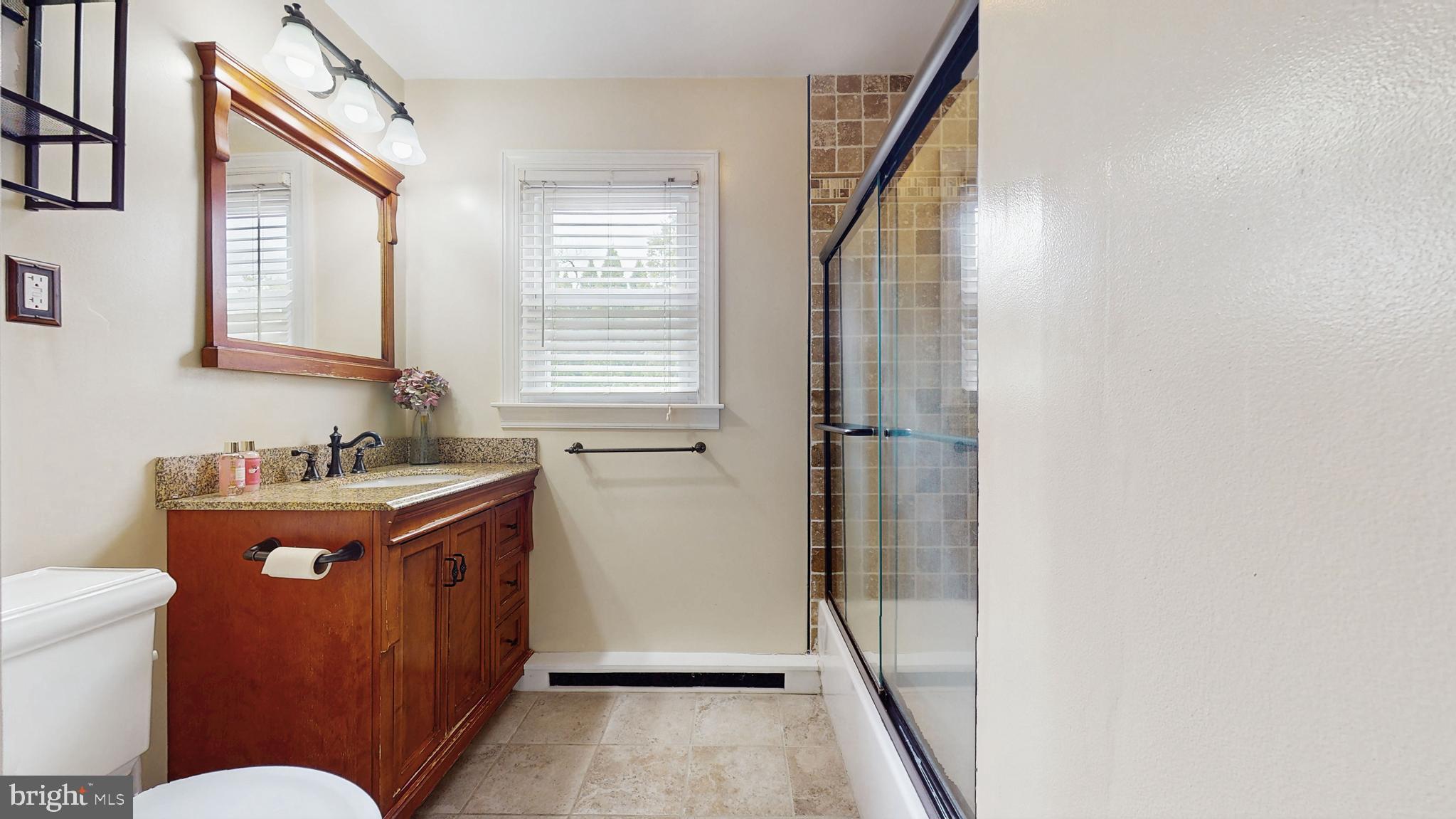 935 Bear Tavern Road Ewing, NJ 08628 - Photo 18 of 25 a bathroom with a sink toilet and shower