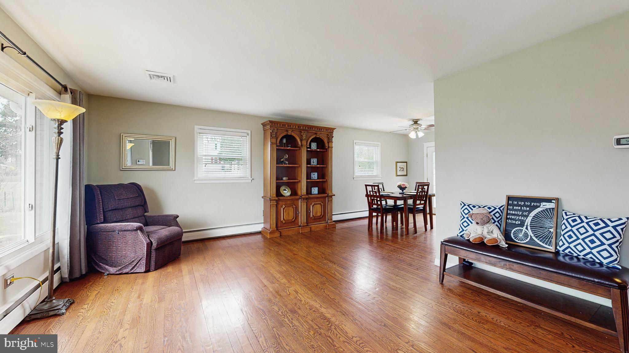 935 Bear Tavern Road Ewing, NJ 08628 - Photo 3 of 25 a living room with furniture and wooden floor