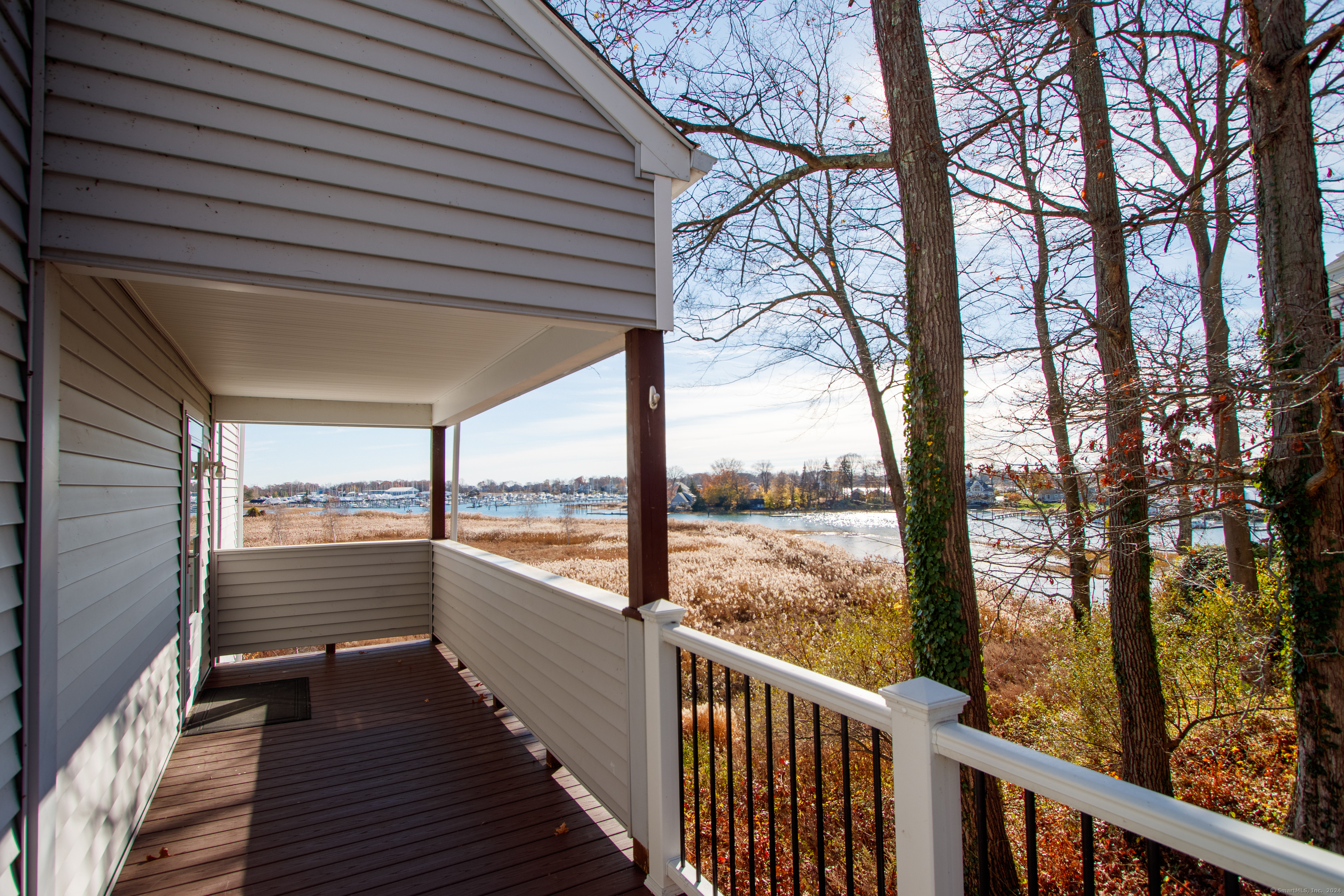70 Quarry Dock Road, Unit 70 Branford, CT 06405 - Photo 1 of 1 Walkway to 70 Quarry Dock Road at Sylvan Point, a waterfront community. This unit is directly facing the Branford River with views of salt marsh and marinas.