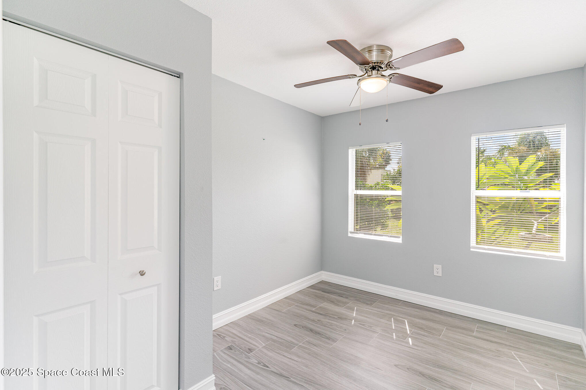 2566 Spence Drive Northeast Palm Bay, FL 32905 - Photo 14 of 20 a view of an empty room with a window