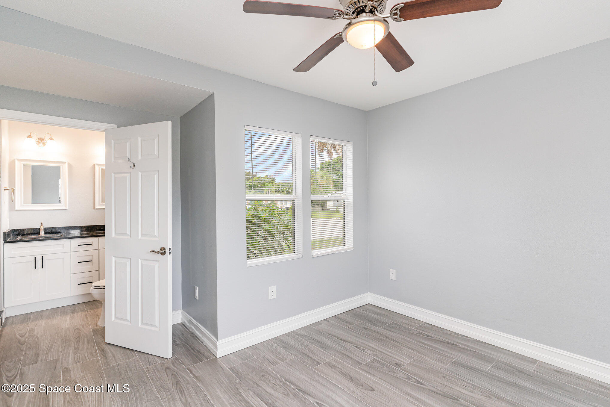 2566 Spence Drive Northeast Palm Bay, FL 32905 - Photo 10 of 20 a view of a kitchen with a sink and cabinet area