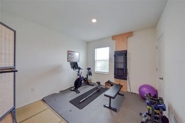 a view of a room with gym equipment