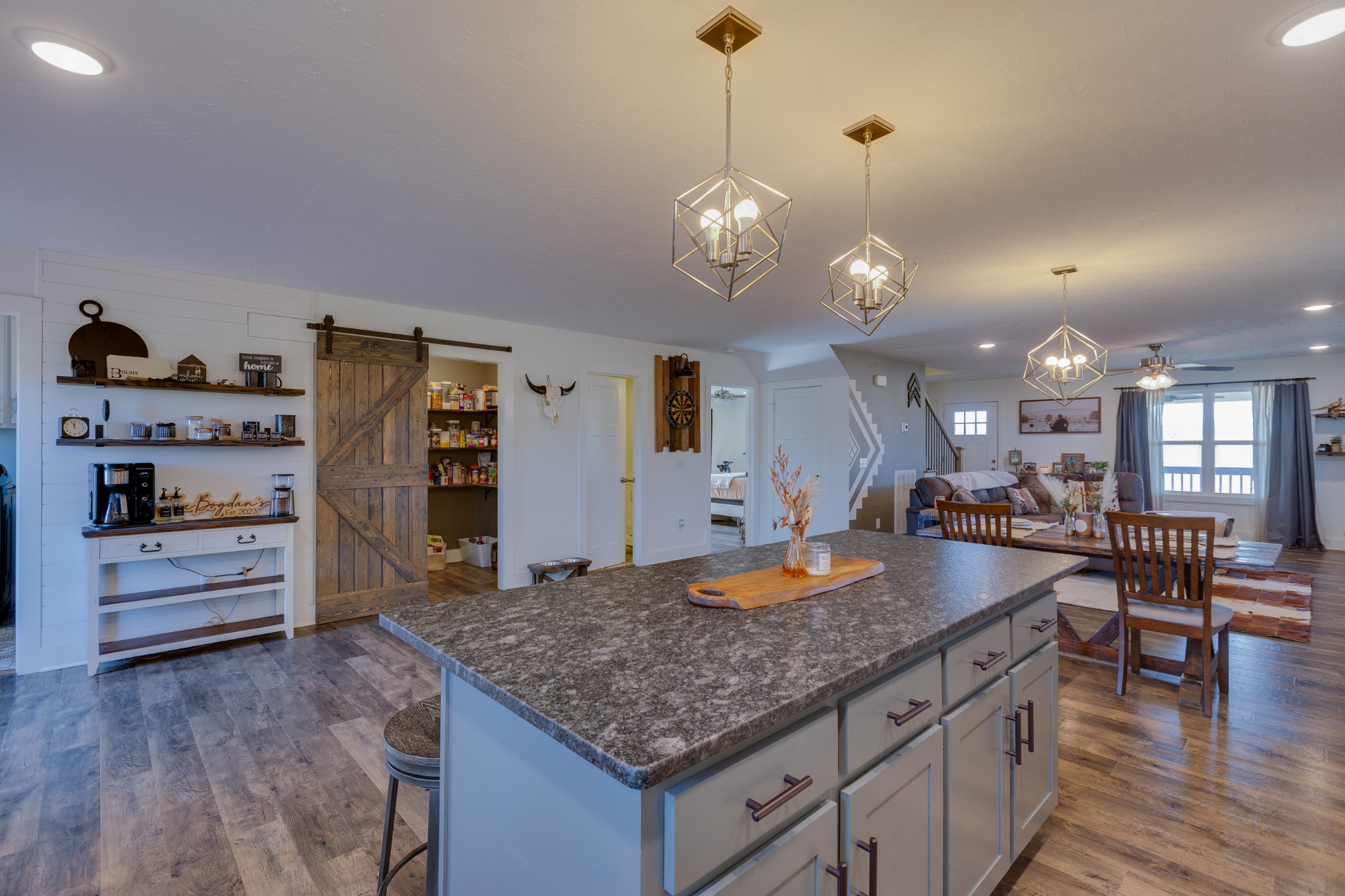 500 Armstrong Road Castalian Springs, TN 37031 - Photo 13 of 35 a kitchen with stainless steel appliances granite countertop a stove and cabinets