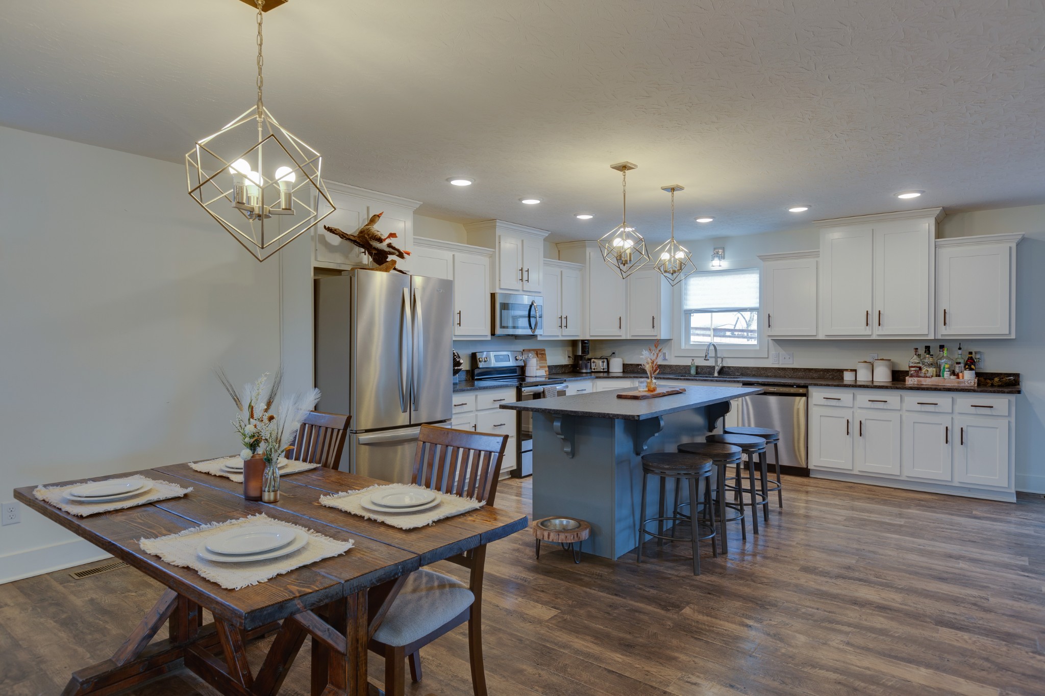 500 Armstrong Road Castalian Springs, TN 37031 - Photo 14 of 35 a view of a dining room with furniture and wooden floor