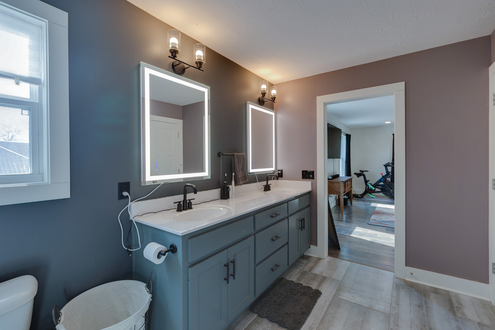 500 Armstrong Road Castalian Springs, TN 37031 - Photo 20 of 35 a bathroom with a toilet a sink and mirror