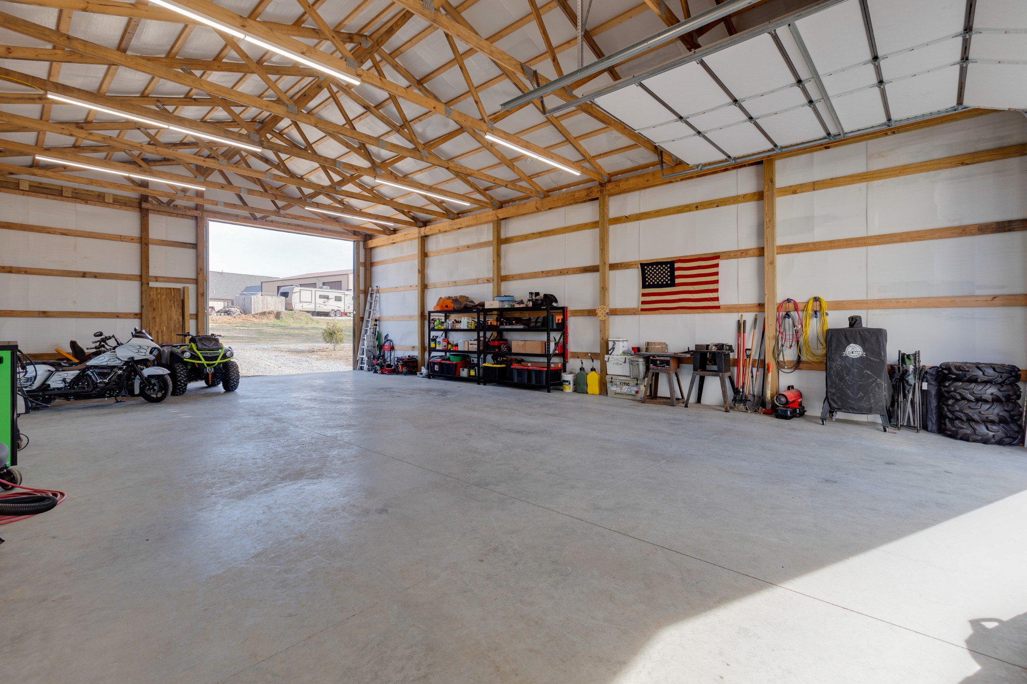 500 Armstrong Road Castalian Springs, TN 37031 - Photo 27 of 35 a view of a garage with cars