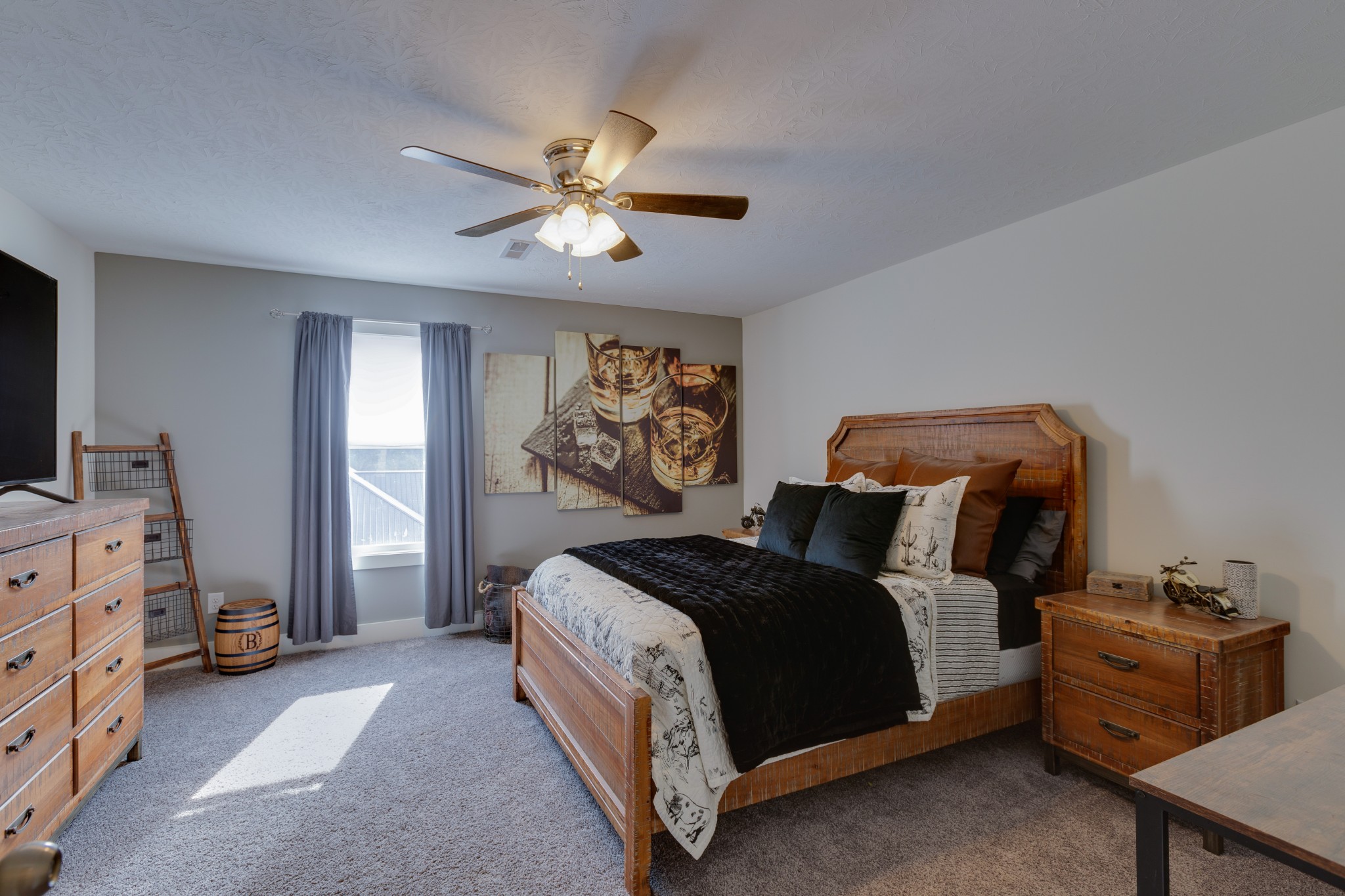 500 Armstrong Road Castalian Springs, TN 37031 - Photo 30 of 35 a bedroom with a bed and a chandelier