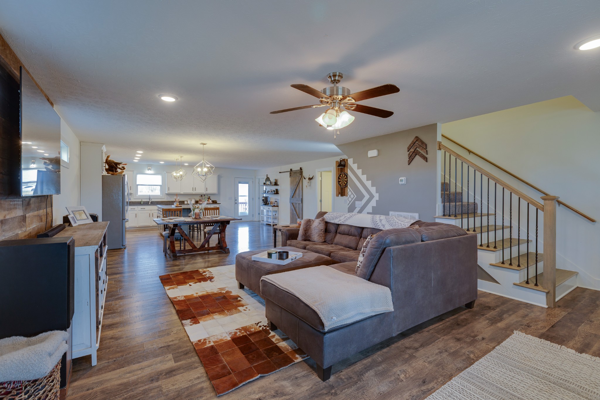 500 Armstrong Road Castalian Springs, TN 37031 - Photo 6 of 35 a living room with furniture and a wooden floor