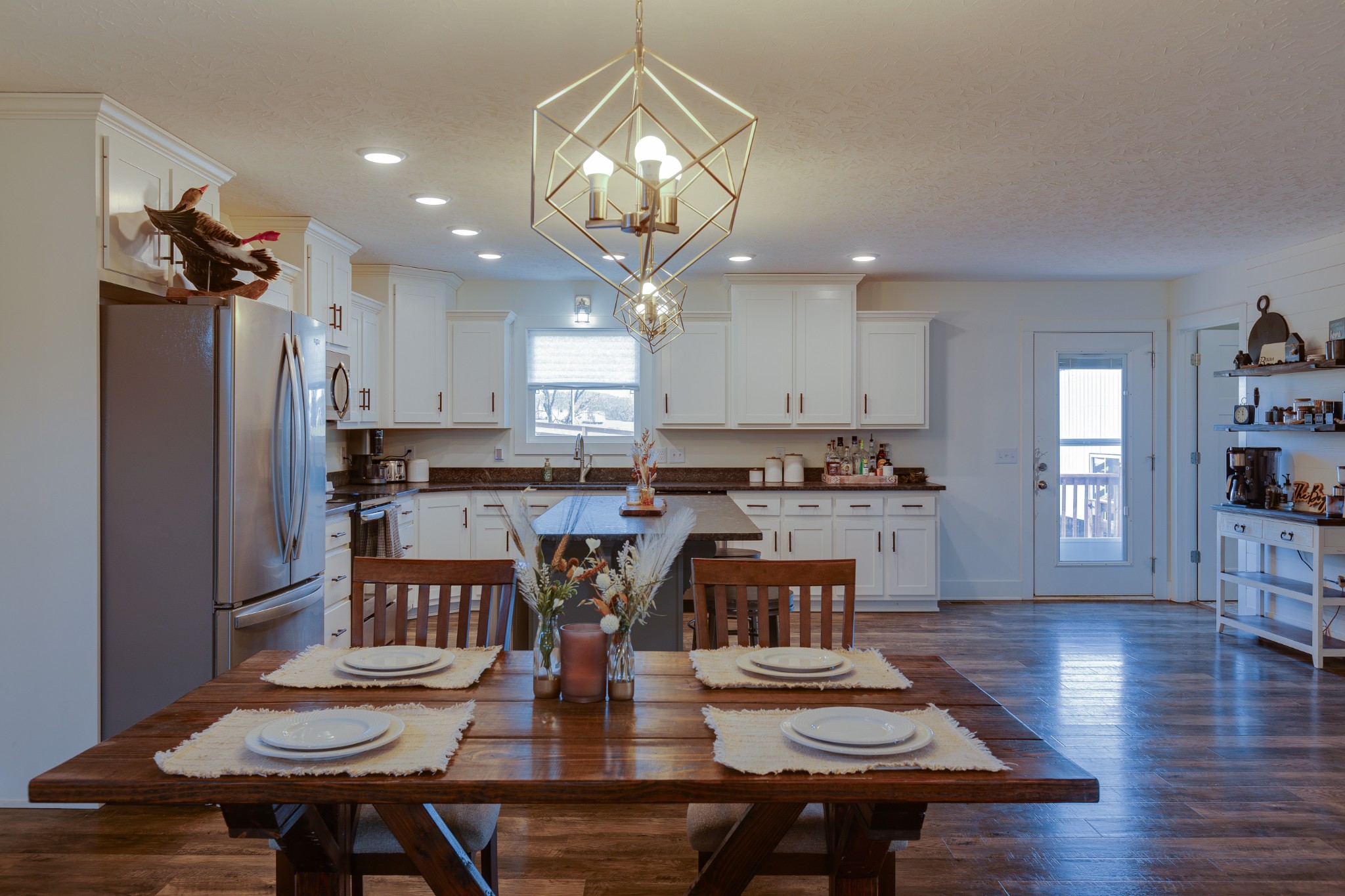 500 Armstrong Road Castalian Springs, TN 37031 - Photo 9 of 35 a view of a dining room with furniture and wooden floor