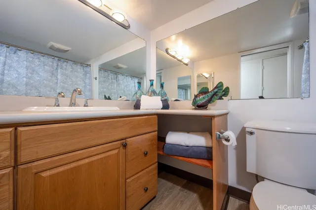 a room with sink washer and dryer