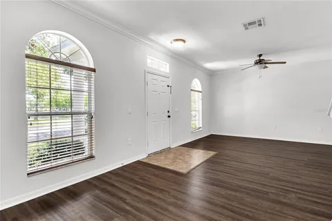 a view of entryway with wooden floor