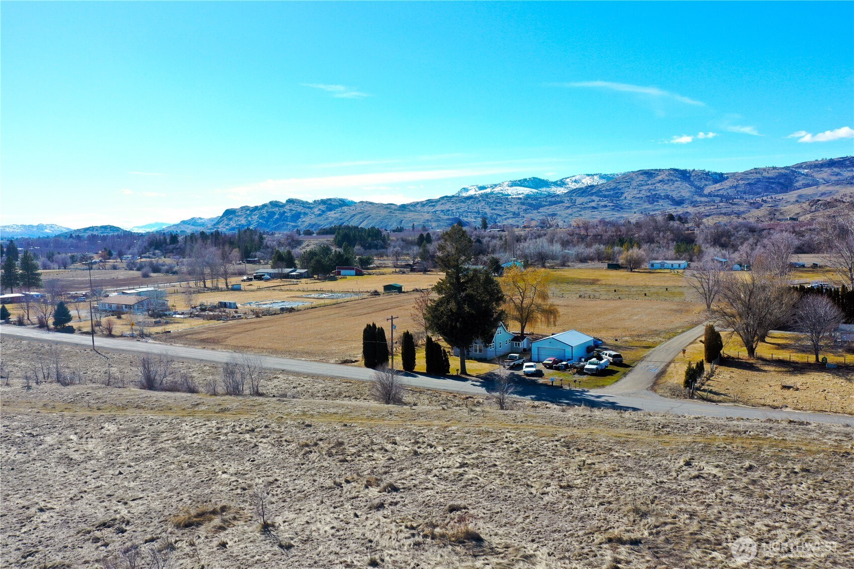 2-lot 2-lot Road Omak, WA 98841 - Photo 4 of 10 a view of a lake with a mountain