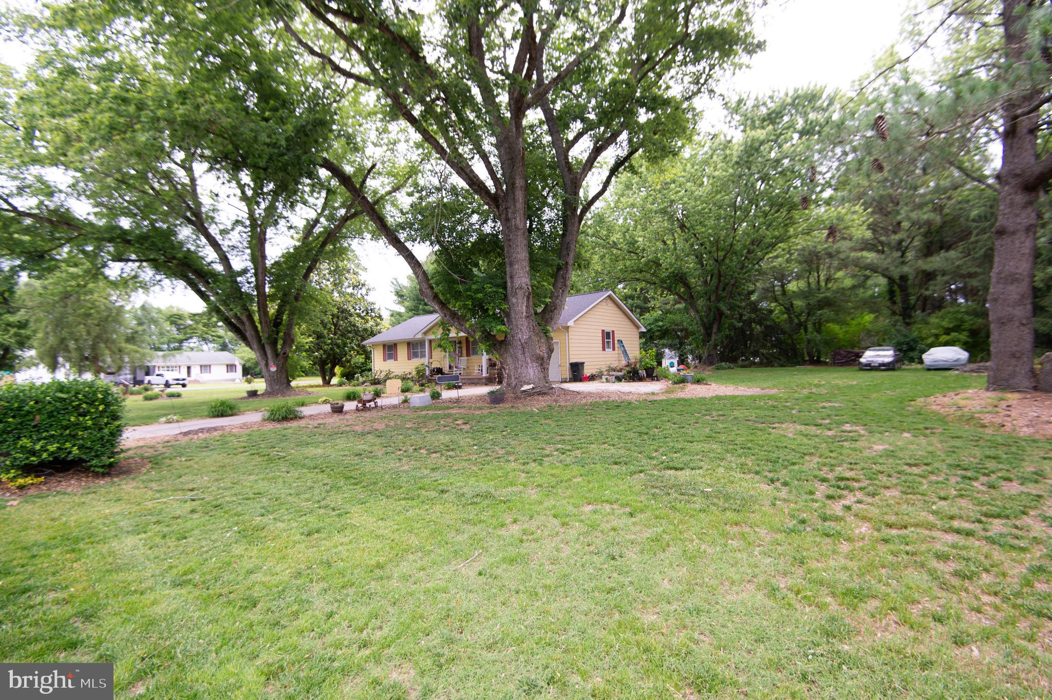 5802 Phyllis Drive Hurlock, MD 21643 - Photo 22 of 26 a view of a house with backyard and garden