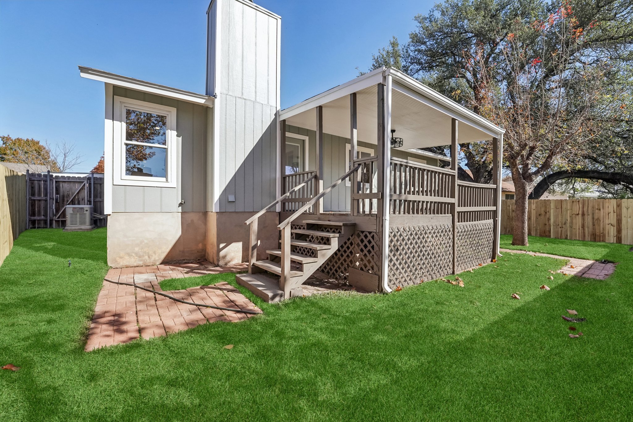 4901 Transit Circle Austin, TX 78727 - Photo 22 of 29 a front view of a house with garden