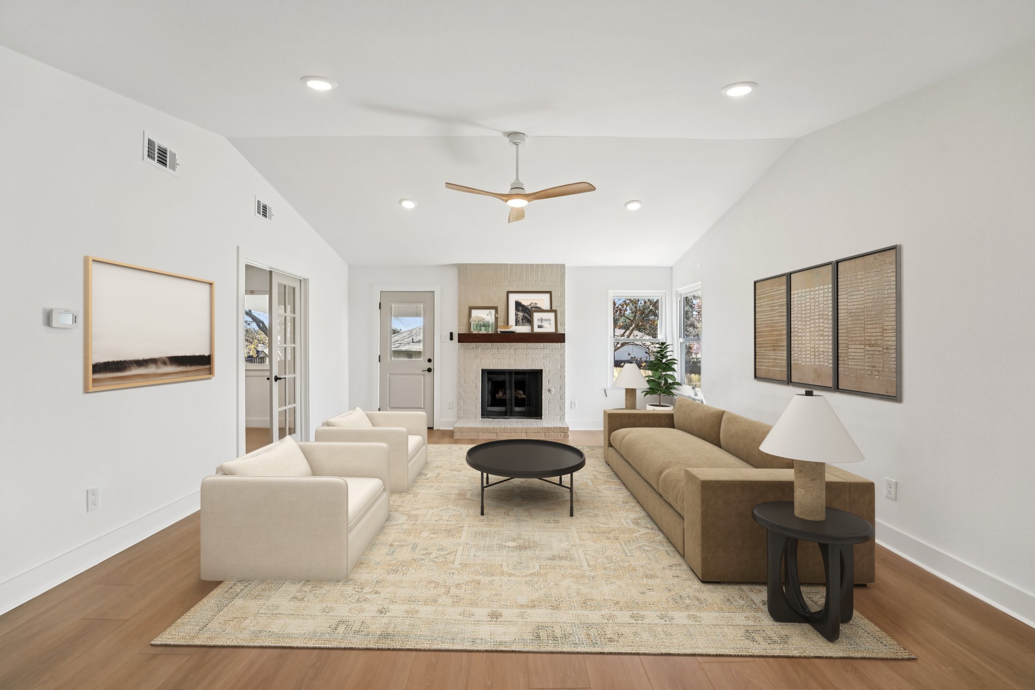 4901 Transit Circle Austin, TX 78727 - Photo 5 of 29 a living room with furniture a fireplace and a ceiling fan