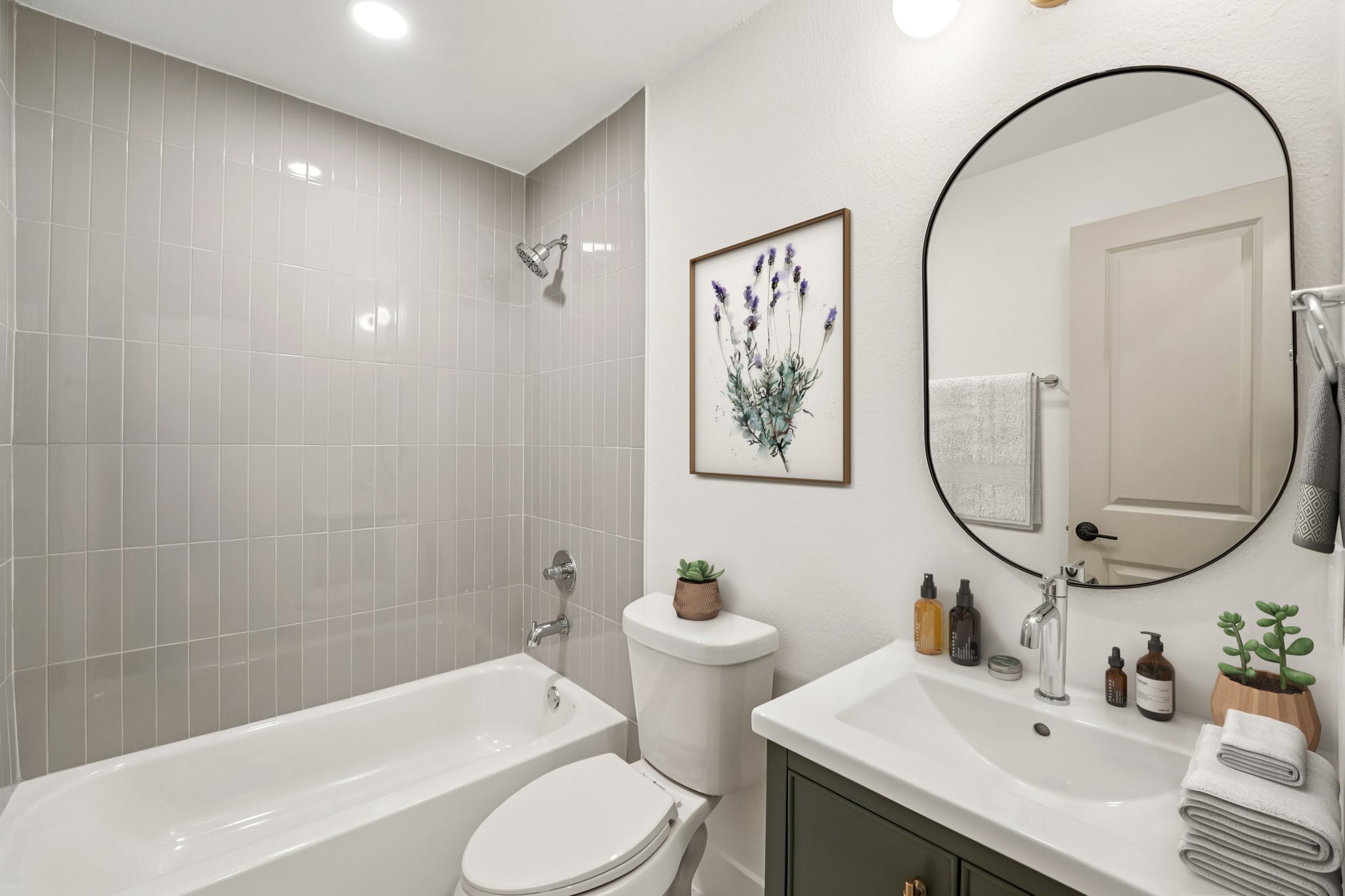 4901 Transit Circle Austin, TX 78727 - Photo 9 of 29 a bathroom with a sink toilet and a mirror