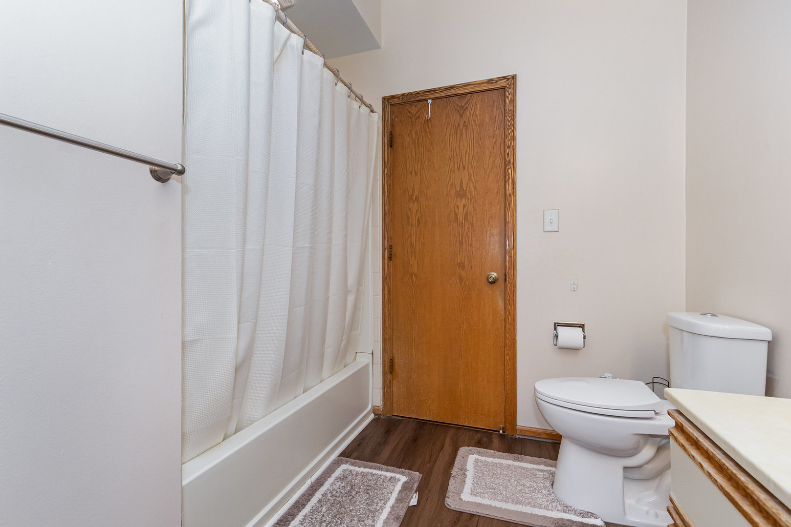 1201 Oak Ridge Drive Streamwood, IL 60107 - Photo 20 of 36 a bathroom with a toilet and a shower