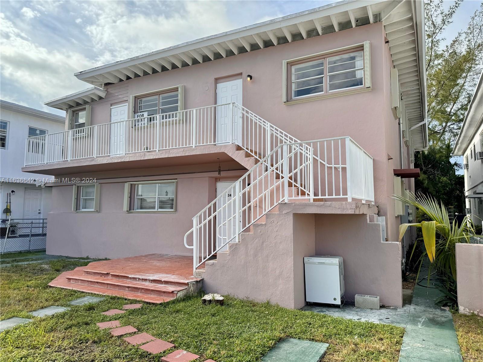 934 79th Terrace, Unit 2 Miami Beach, FL 33141 - Photo 36 of 42 a house view with a garden space