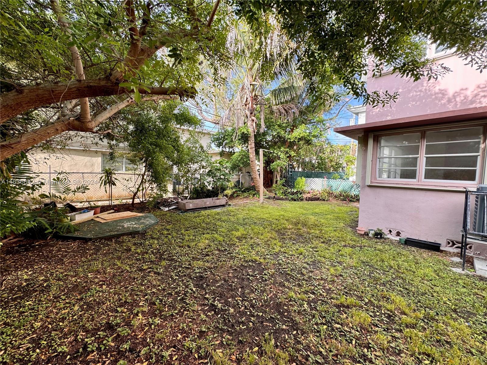 934 79th Terrace, Unit 2 Miami Beach, FL 33141 - Photo 41 of 42 a view of a house with a yard