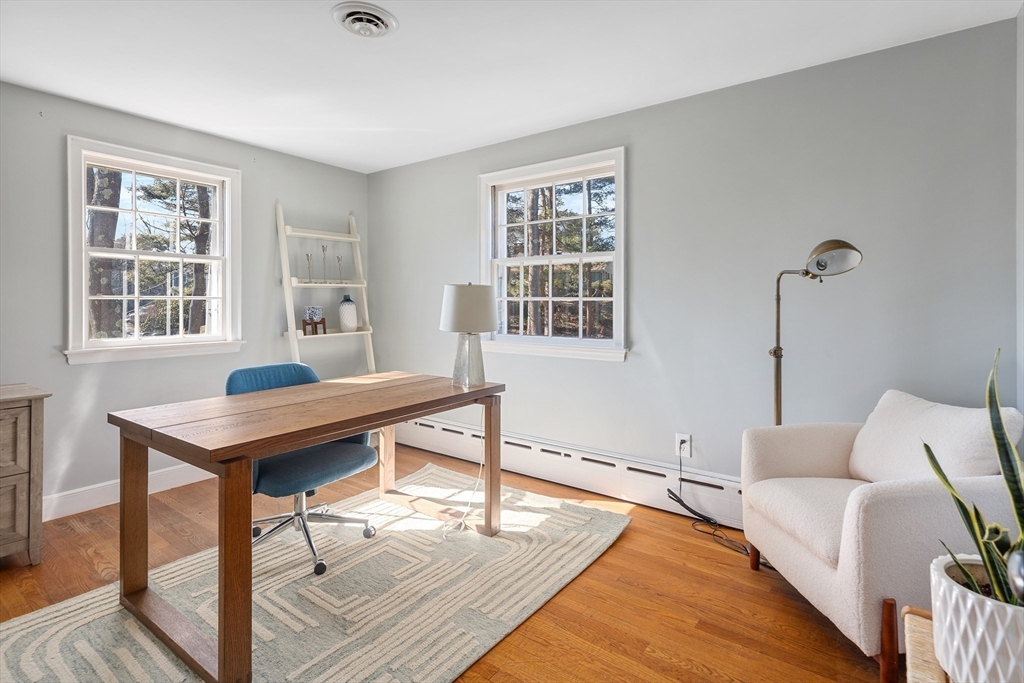 36 Howland Lane Hingham, MA 02043 - Photo 17 of 33 a living room with furniture a window and a table