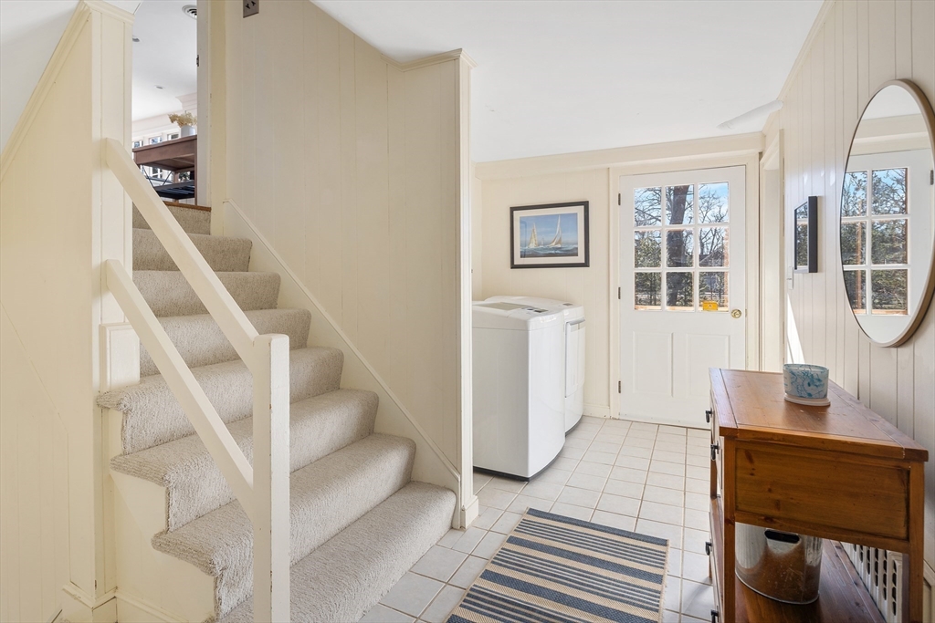 36 Howland Lane Hingham, MA 02043 - Photo 19 of 33 a view of entryway and hall with wooden floor