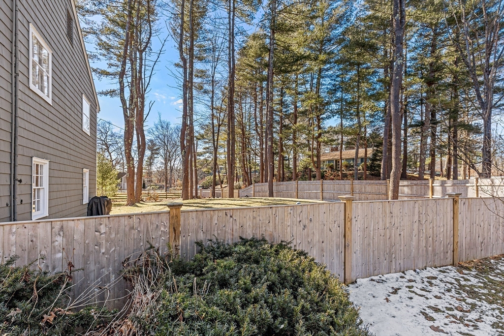 36 Howland Lane Hingham, MA 02043 - Photo 25 of 33 a view of a backyard of the house