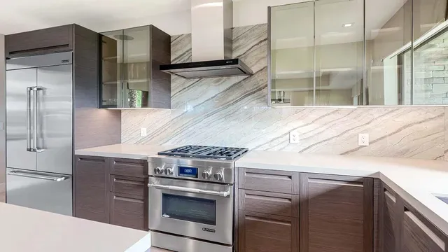 a living room with furniture a flat screen tv and a large window