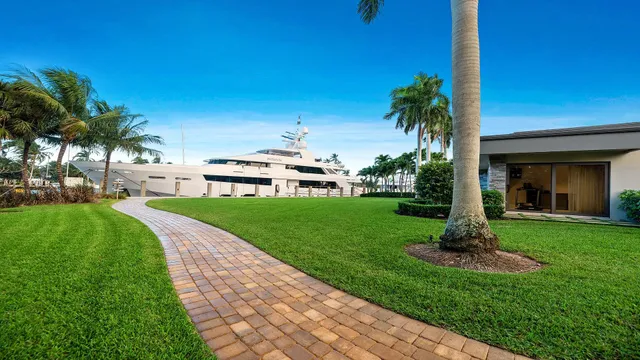 a view of swimming pool with a yard