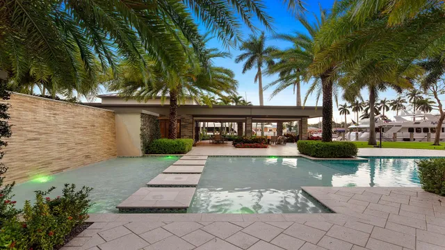 an aerial view of a house with outdoor space