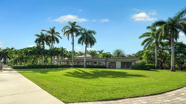 a view of a house with a swimming pool