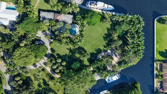 a terrace with outdoor seating and trees