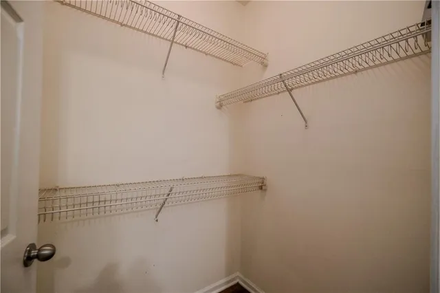 a view of a room with racks on the wall