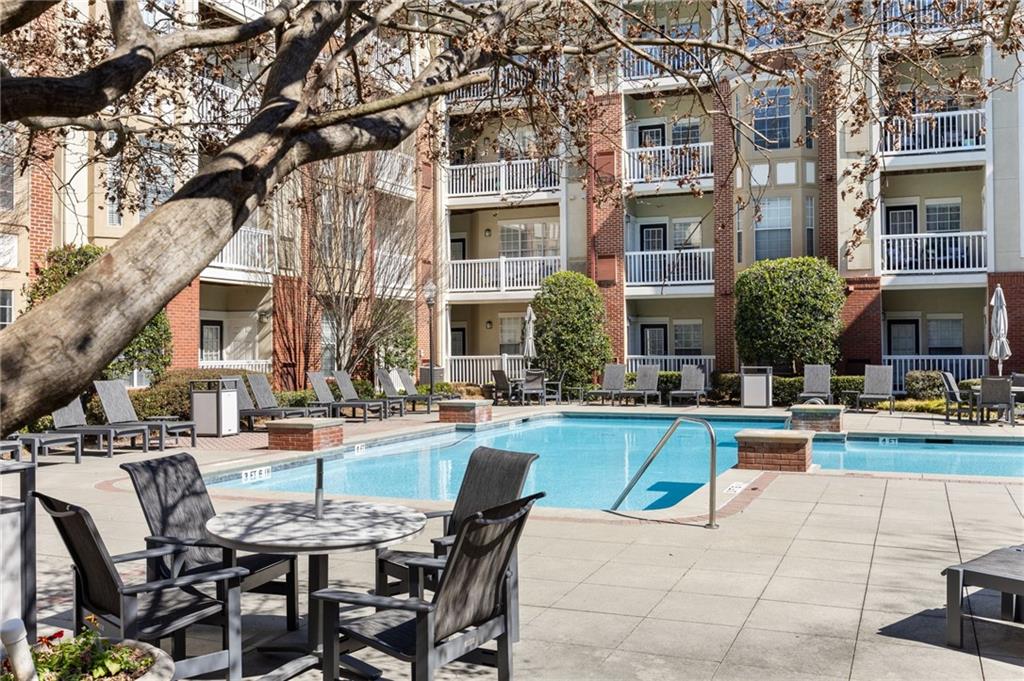 4007 Westchester Ridge Northeast Atlanta, GA 30329 - Photo 27 of 35 a view of a building and yard with swimming pool