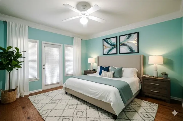 a bedroom with a large bed and a window