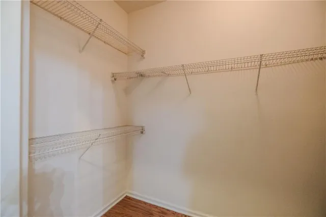 a view of a room with racks on the wall