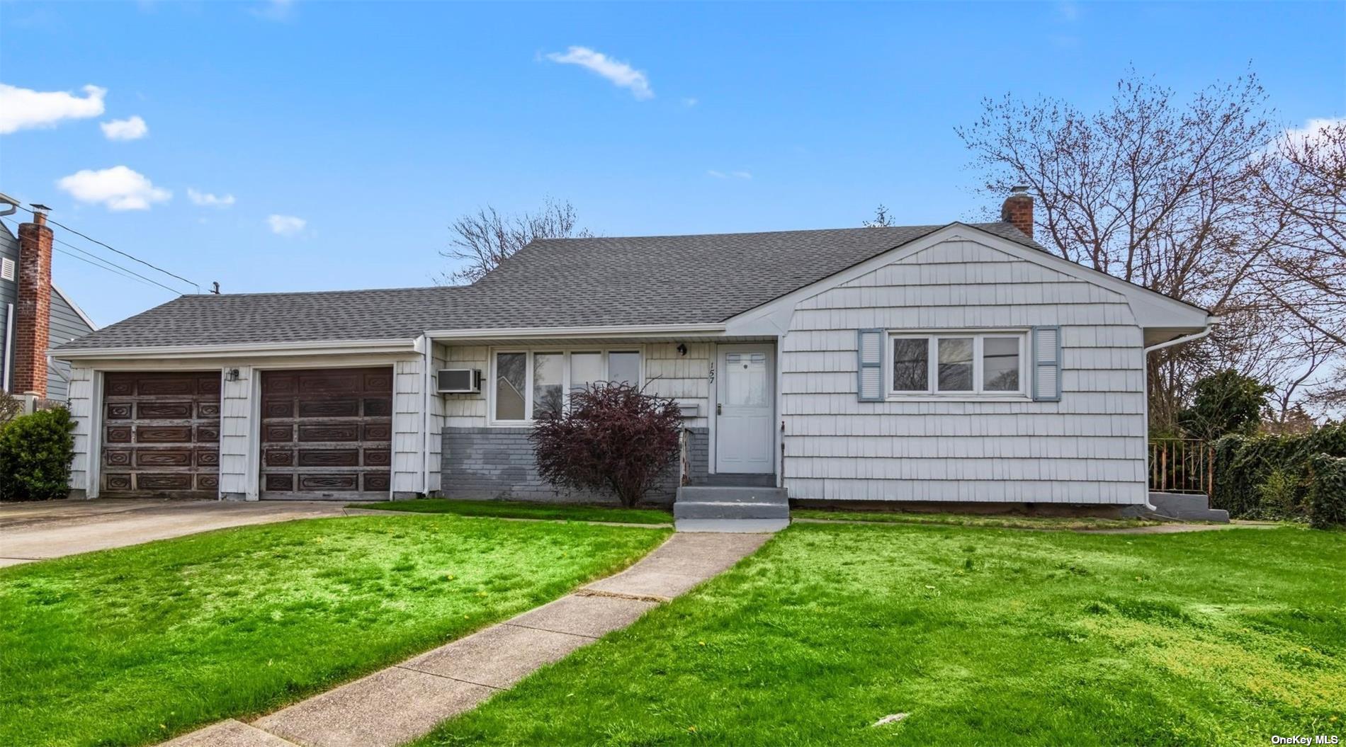 Soooo Much Potential In This Spacious Split Level Home On A Beautiful Street In The Sought After "Sunset City" Section Of North Babylon!