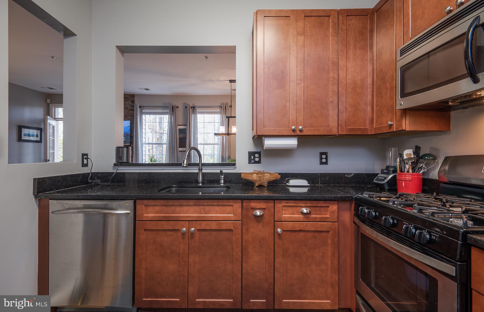 11401 Gate Hill Place, Unit 74 Reston, VA 20194 - Photo 13 of 30 Open view to Dining Room